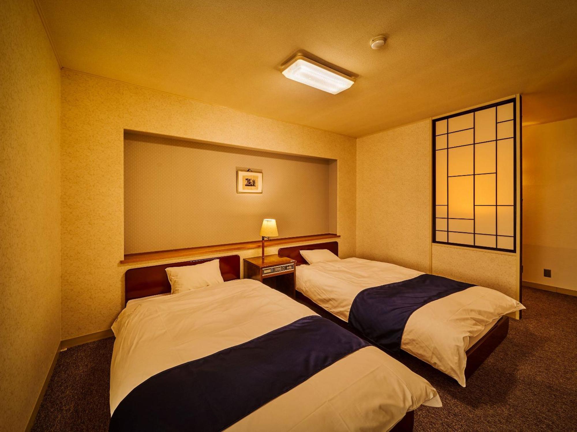 Hotel Ooedo Onsen Monogatari Dogo Macujama Pokoj fotografie
