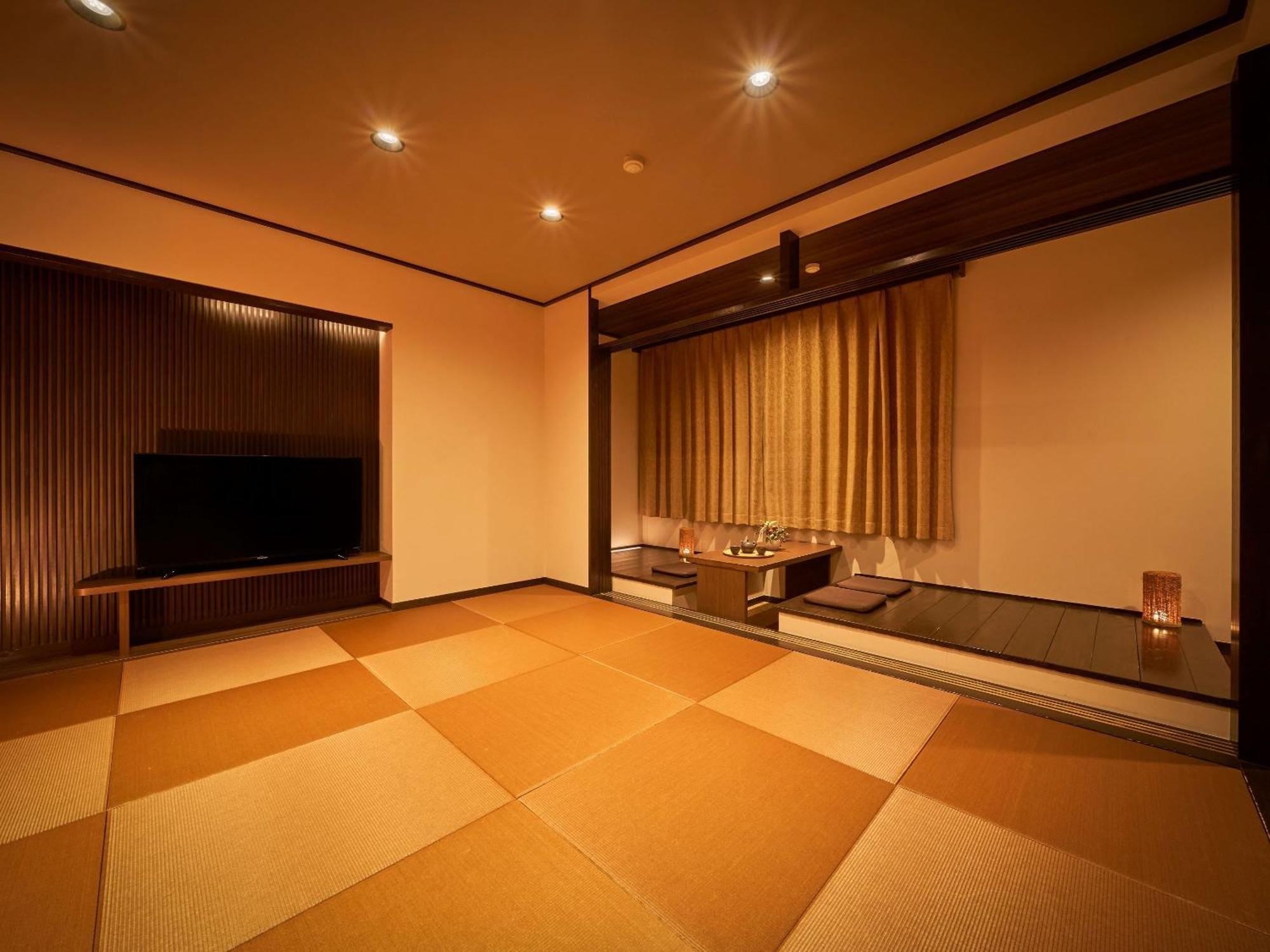 Hotel Ooedo Onsen Monogatari Dogo Macujama Pokoj fotografie