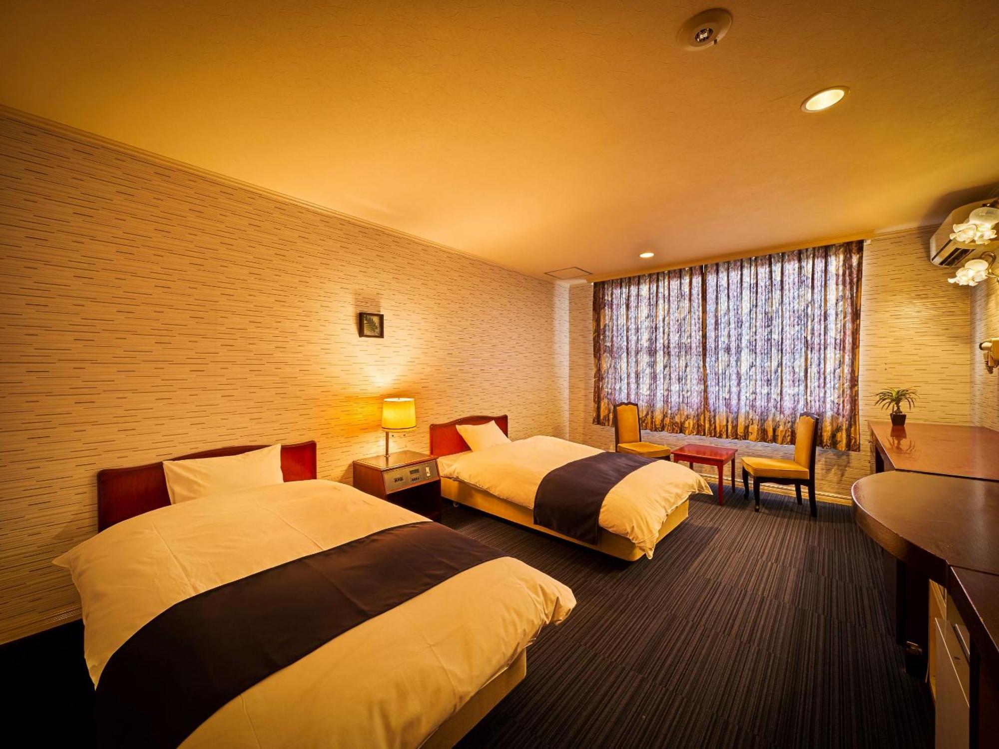 Hotel Ooedo Onsen Monogatari Dogo Macujama Pokoj fotografie